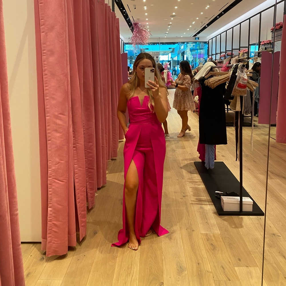 Wide split leg hot pink strapless jumpsuit